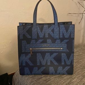 MK bag. This bag is big and holds alot of things. New only used for a month.